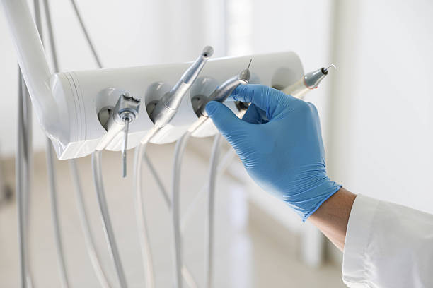 Professional Dental Implants technician working in University Gardens, NY